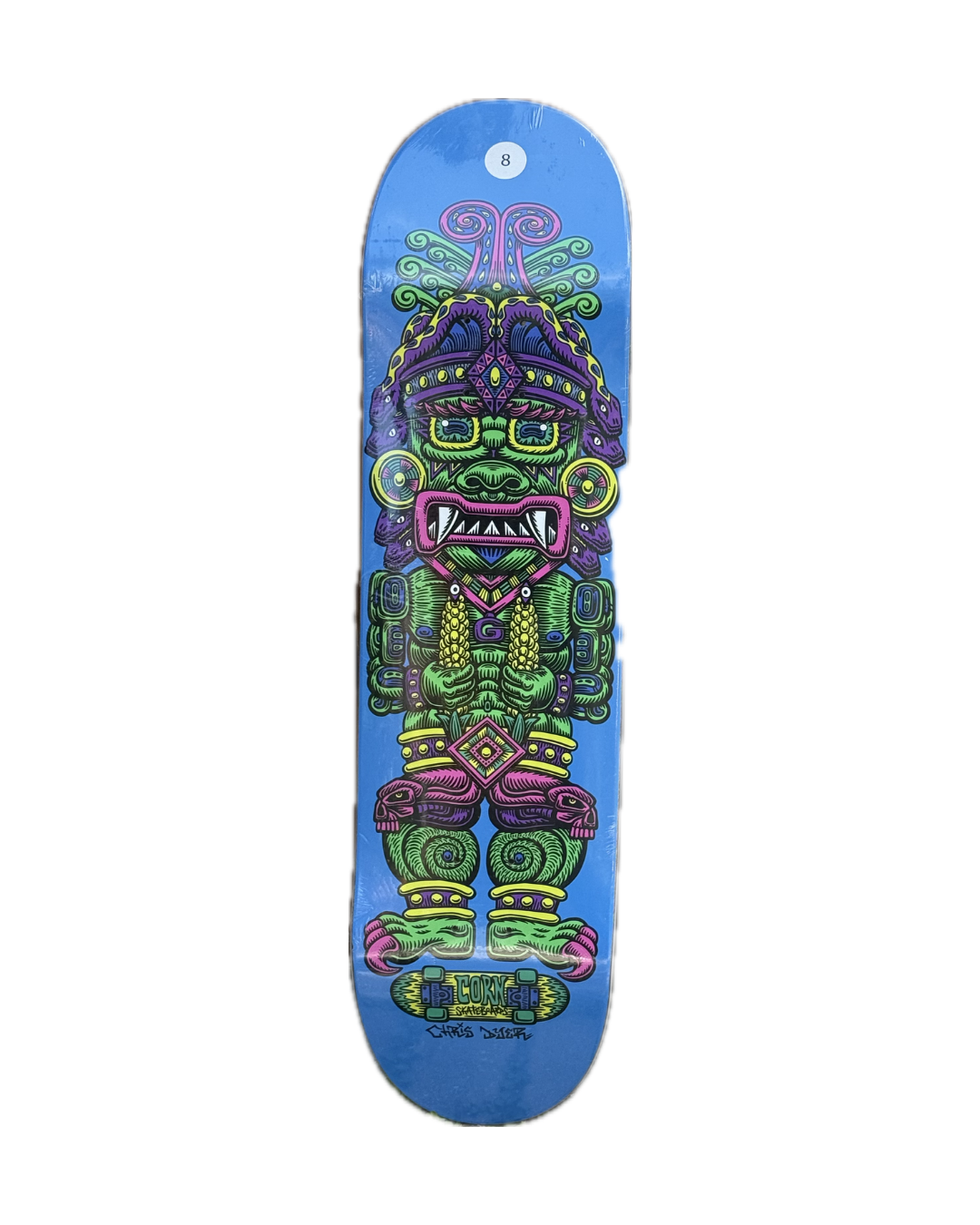A skateboard deck with a vibrant blue background featuring Chris Dyer’s colorful psychedelic depiction of Wiracocha, the Incan Corn God, in green, purple, and pink.
