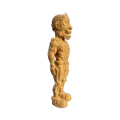The Galaktic Dude Figurine, a golden warrior figurine with a tribal mask head standing upright.