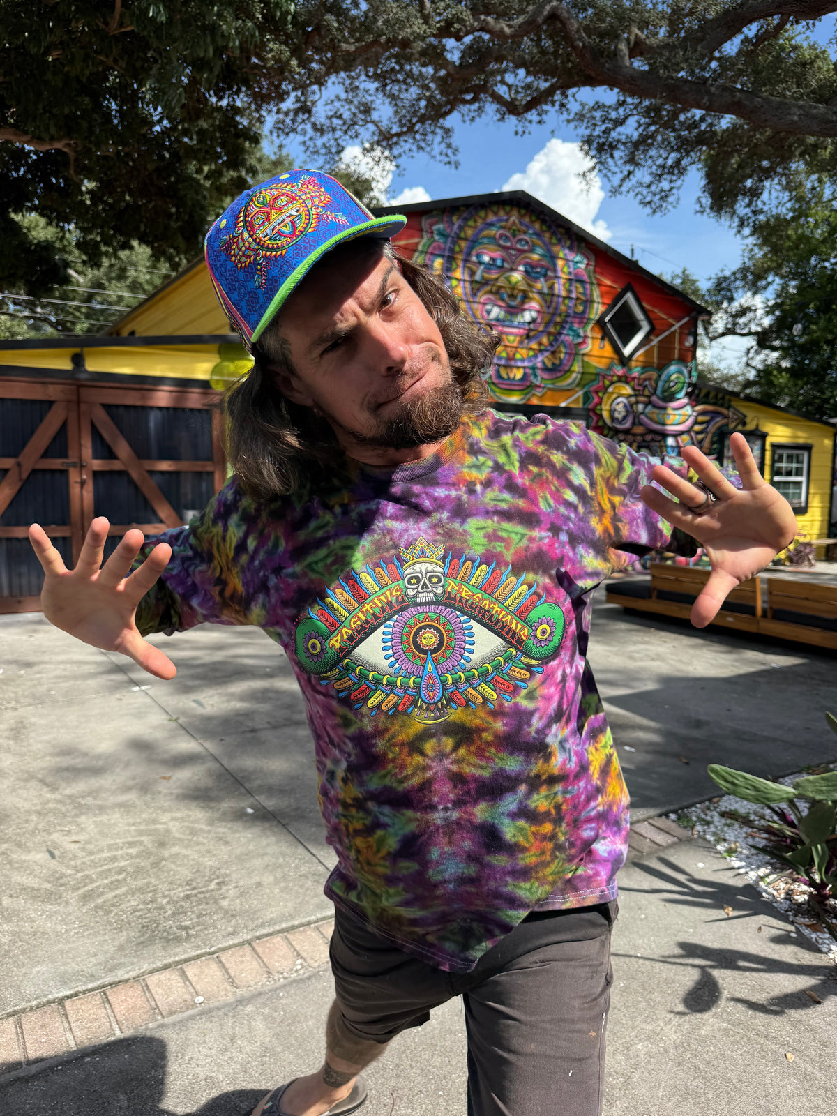 Chris Dyer modeling the Positive Eye Cosmic handmade tie-dye long-sleeve shirt