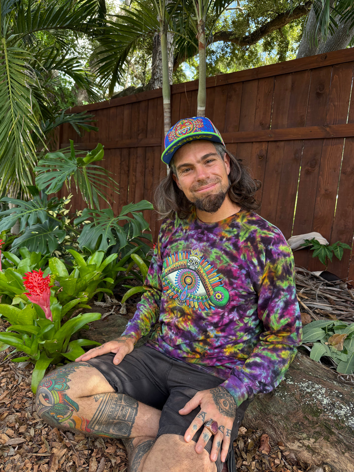 Chris Dyer modeling the Positive Eye Cosmic handmade tie-dye long-sleeve shirt
