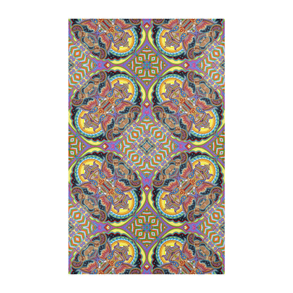 Jai Ganesha Mandala Area Rug by Chris Dyer featuring symmetrical Ganesha imagery, intricate geometric patterns, and vibrant yellow, turquoise, purple, and orange tones.